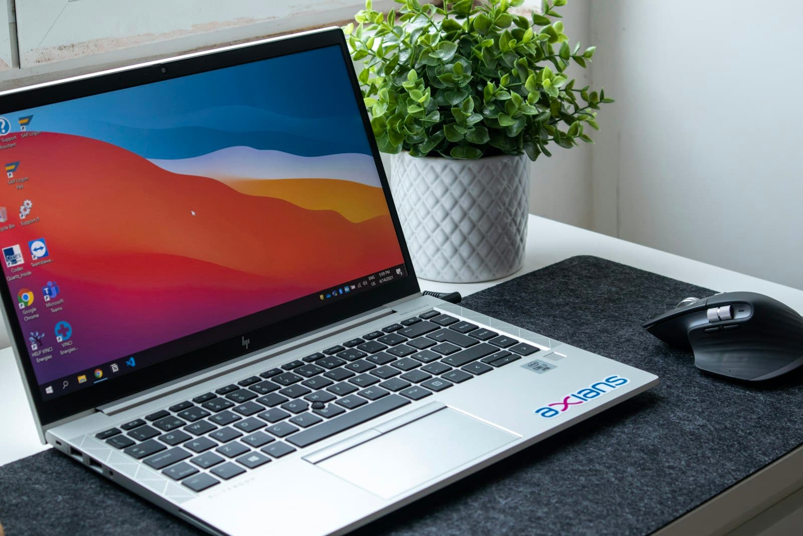 Silver Windows business laptop on a desk